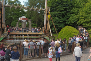 people waiting in an amusement park in the 90s