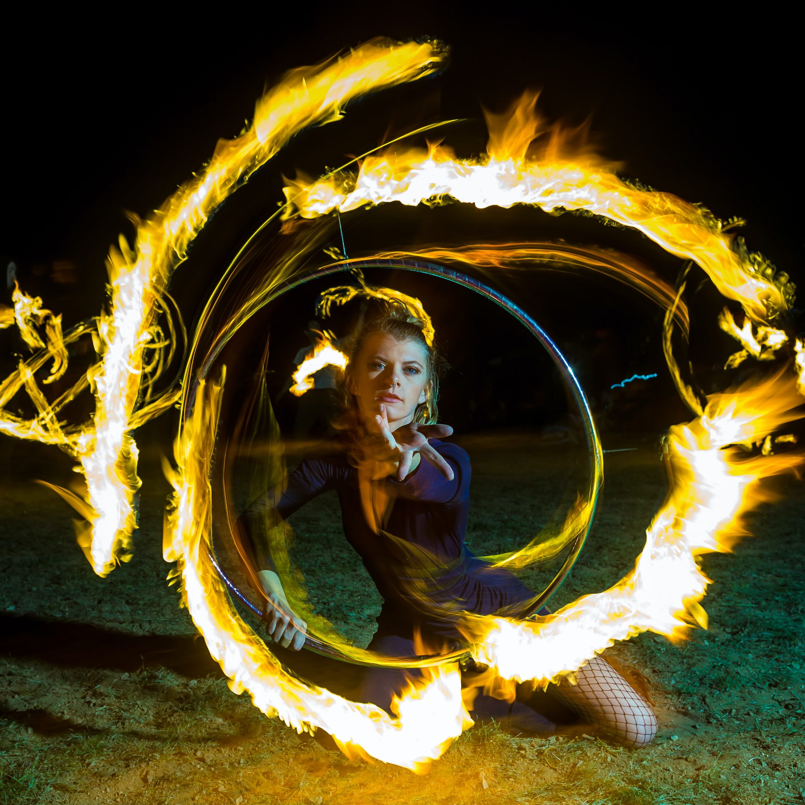 a woman with circles of fire