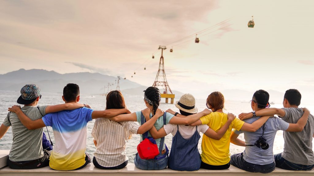 group of friends travelling together in a covid free world