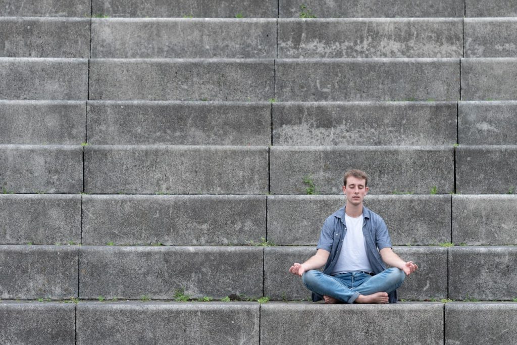 a man meditates after work