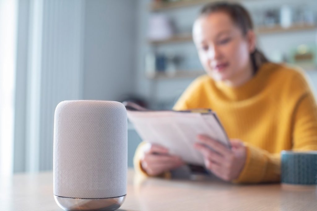 woman talking to a virtual assistant
