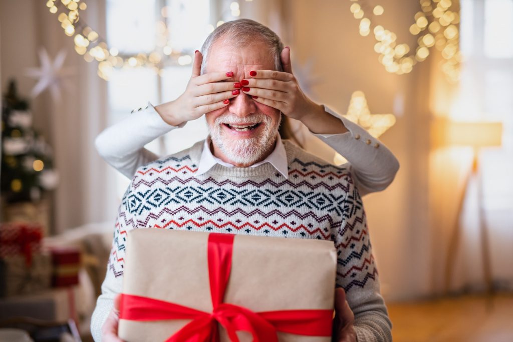 a consumer being surprised with a christmas gift.