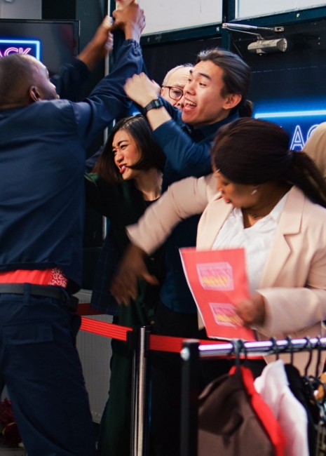 Consumers queue for Black Friday.
